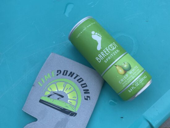 drink and koozie on cooler - lime pontoon rentals