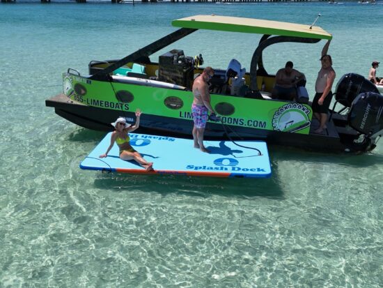 lemon lime pontoon boat with floating lilly pad