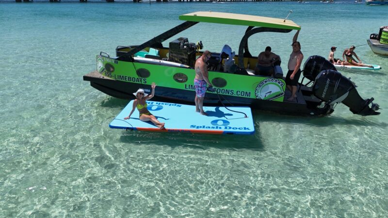 lemon lime pontoon boat with floating lilly pad