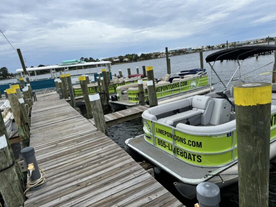 pontoon boat rentals docked at the marina in fort walton beach florida